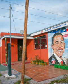 Miami, USA. December 22, 2009. A retaurant in Little Haiti exhibits a mural in suport of presidential candidate Barak Obama.