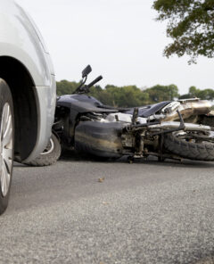 Motorbike Accident on the road with a car