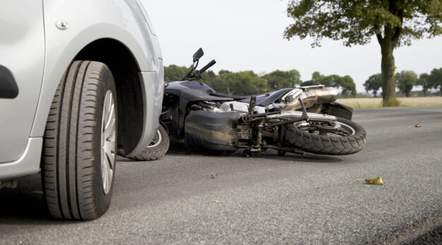 Motorbike Accident on the road with a car