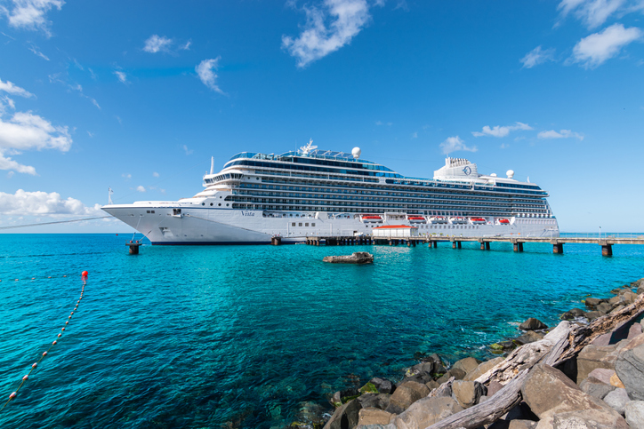 Roseau, Dominica - November 24, 2023: Side view of beautiful cruise ship Oceania Cruises Vista in port of Roseau, Dominica.